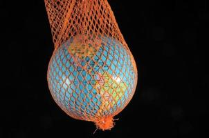 Globe in a net photo