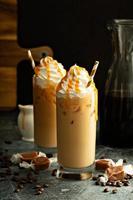 Caramel iced latte with whipped cream photo