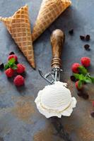 Vanilla ice cream scoop in a spoon photo