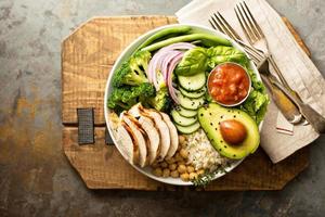 Healthy lunch bowl with grilled chicken photo