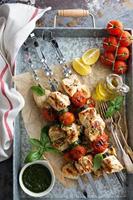 Chicken kabobs on a tray photo