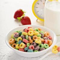 Fruit colorful sweet cereals in a bowl photo