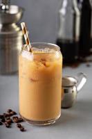 Cold brew iced coffee in glass bottles photo