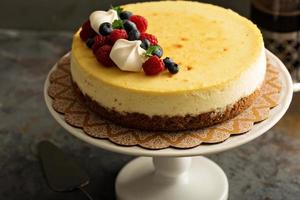 New York cheesecake on a cake stand photo