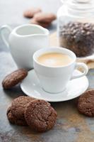 Chocolate cookies with a cup of coffee photo