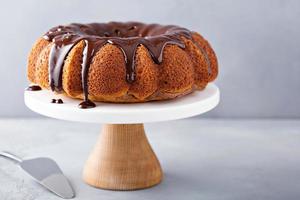 Vanilla bundt cake with chocolate glaze photo