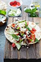 Flatbread with beef and vegetables photo