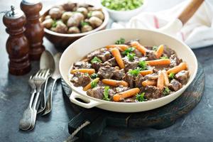 Beef stew with carrots and parsley photo