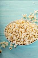 Cheddar cheese popcorn in a white bowl