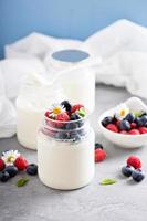 Fresh homemade yogurt in small jars photo