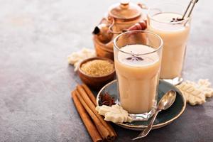 Hot masala tea with spices photo