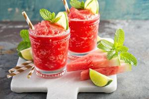 Watermelon slushie cocktail with lime photo