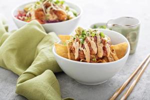 Poke bowl with fried wonton wrappers photo