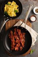 Cooked bacon on a skillet photo