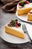 Pumpkin cheesecake with sour cream topping photo