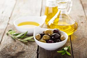 Olive oil in vintage bottle photo