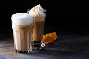 Coffee latte and viennese coffee with whipped cream photo