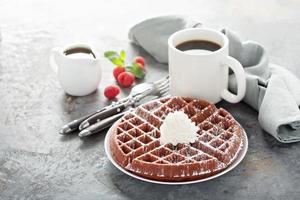 Red velvet waffles with whipped cream photo