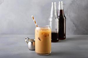 Cold brew iced coffee in glass bottles photo