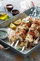 Chicken kabobs on a tray photo