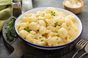 Cauliflower with cheese sauce photo