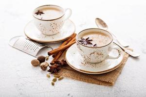 Masala tea in cup with winter spices photo