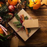 Christmas background with oranges, candy canes and decorations photo