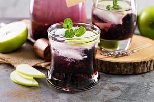 Refreshing cocktail with blackberry and lavender photo