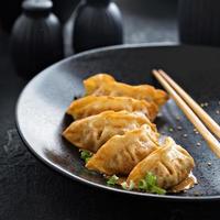 Fried potstickers with green onions photo