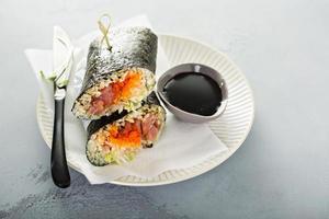 Sushi or poke burrito with nori photo