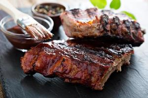 Grilled pork baby ribs with bbq sauce photo