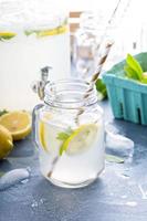 Fresh citrus lemonade in beverage dispenser photo