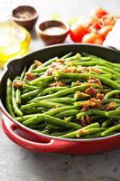 Green beans with caramelized pecans photo
