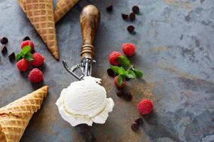 Vanilla ice cream scoop in a spoon photo