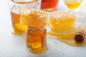Various types of honey and honeycomb photo