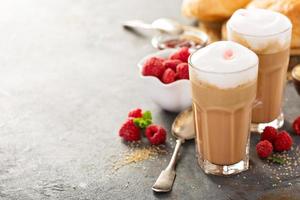 Hot coffee latte with raspberry syrup photo