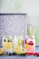 Variety of lemonade in jars photo