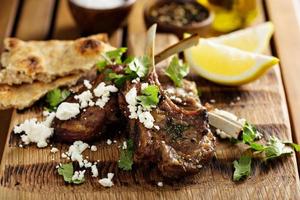 Lamb chops with herbs and feta photo