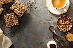 Fudgy brownies with nuts and caramel photo