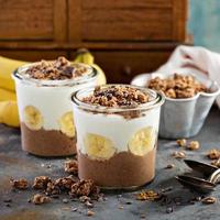 Chocolate chia pudding parfait with banana photo