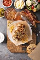 Baked potato with pulled pork photo