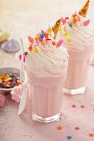 Unicorn milkshakes with sprinkles photo