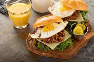 Pulled pork breakfast sandwiches with fried egg photo