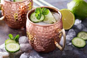 Moscow mule cocktail with lime and cucumber photo