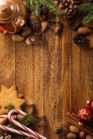 Christmas background with nuts, decorations and candy cane photo