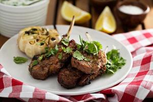 Lamb chops grilled with herbs photo