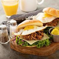 Pulled pork breakfast sandwiches with fried egg