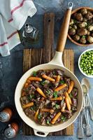 Beef stew with carrots and parsley photo