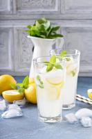 Classic lemonade on blue background photo
