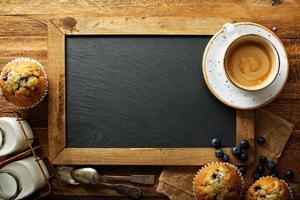 Freshly baked blueberry muffins in a rustic setting photo